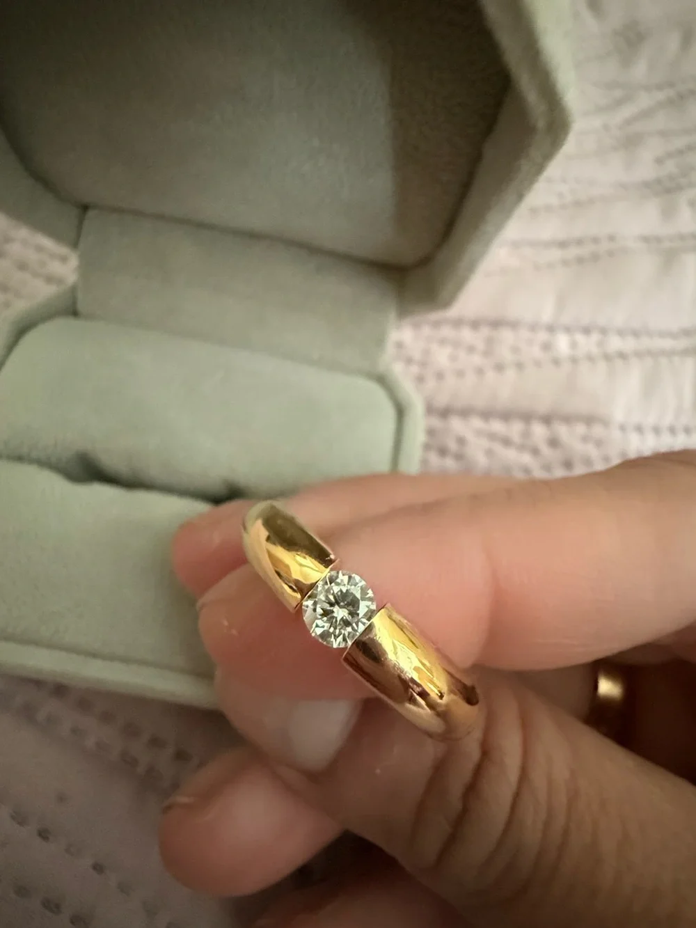 Ashley Zhang tension set diamond ring in  18 karat yellow gold